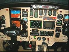 Process of an installation of dual Cobham/Chelton EFIS screens and Wulfsberg communications and navigation equipment in a Cessna Citation. The photo shows the completed installation.