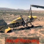 Photo of a crashed experimental aircraft recovery.