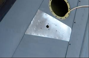 Photo of RC-26B Vertical Stabilizer Modification.